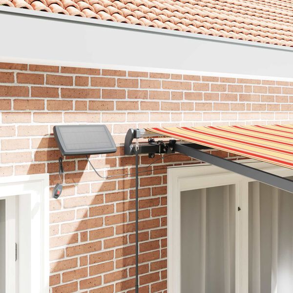 vidaXL Vetoutuva markiisi Keltainen ja oranssi 300 x 250 cm kangas