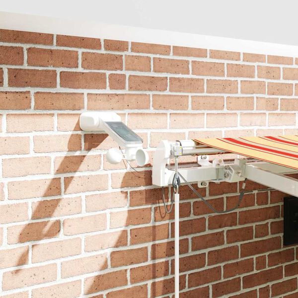 vidaXL Vetoutuva markiisi Keltainen ja oranssi 450 &times; 300 cm