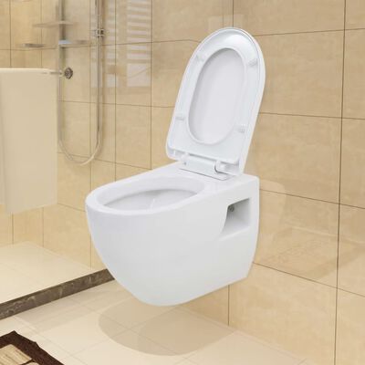 vidaXL Seinään kiinnitettävä WC-istuin keraaminen valkoinen
