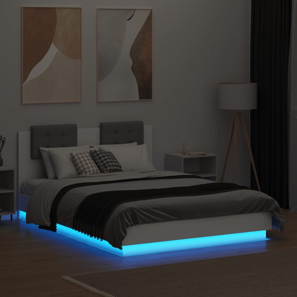 vidaXL Sängynrunko päädyllä ja LED-valoilla valkoinen 140x190 cm